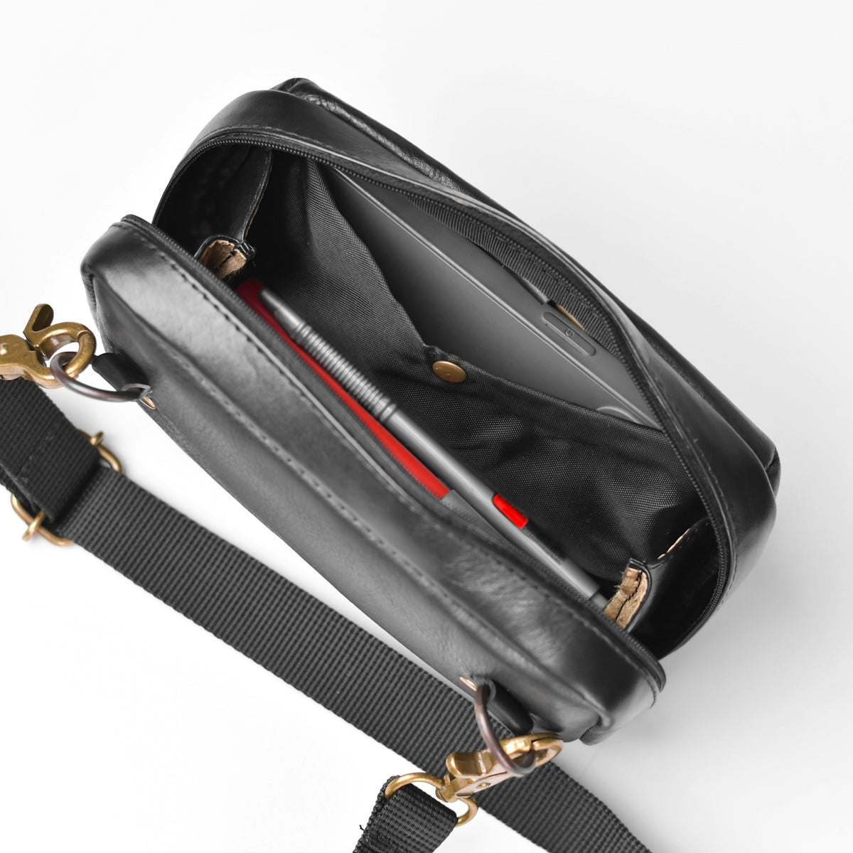 a black bag with a red stripe on it