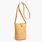 MUGRS women's small crossbody bag in Orange – front view, waxed vegetable-tanned leather