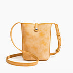 MUGRS women's crossbody phone bag in Orange – shoulder strap shown, compact day bag