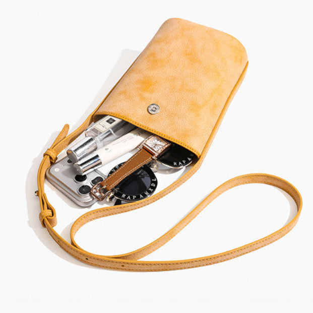 MUGRS women's leather phone purse in Orange – open top, fits a cell phone and cards, close-up