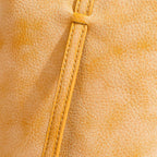 MUGRS women's leather crossbody bag – grain close-up, chrome-free vegetable-tanned, waxed finish