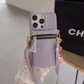 MUGRS women's phone bag in Lilac – adjustable strap detail, compact, hands-free