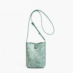 MUGRS women's crossbody phone bag in Green – front view, adjustable strap, everyday hands-free