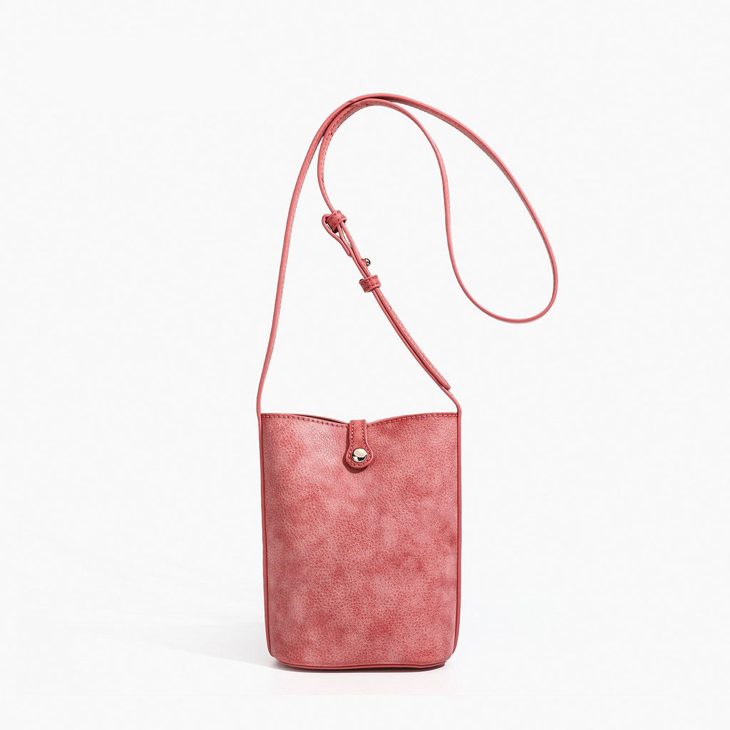 MUGRS women's crossbody purse in Watermelon Red – front view, compact for phone and keys