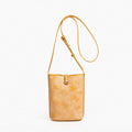 MUGRS women's leather crossbody bag in Orange – front view, lightweight everyday carry