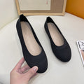 MUGRS women's flats in Black – top-down flat lay, versatile