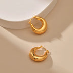 Mugrs™ – Klobige Creolen mit Doppelkreis aus 18 Karat Gold