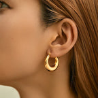 Mugrs™ – Klobige Creolen mit Doppelkreis aus 18 Karat Gold