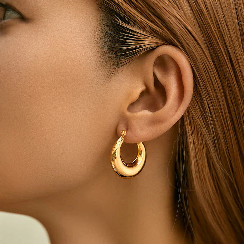 Mugrs™ – Klobige Creolen mit Doppelkreis aus 18 Karat Gold