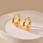 Mugrs™ – Klobige Creolen mit Doppelkreis aus 18 Karat Gold