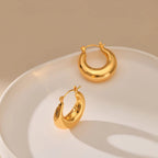 Mugrs™ – Klobige Creolen mit Doppelkreis aus 18 Karat Gold