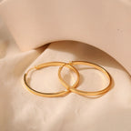 Mugrs™ 18K Gold Dainty Huggie Hoop Earrings