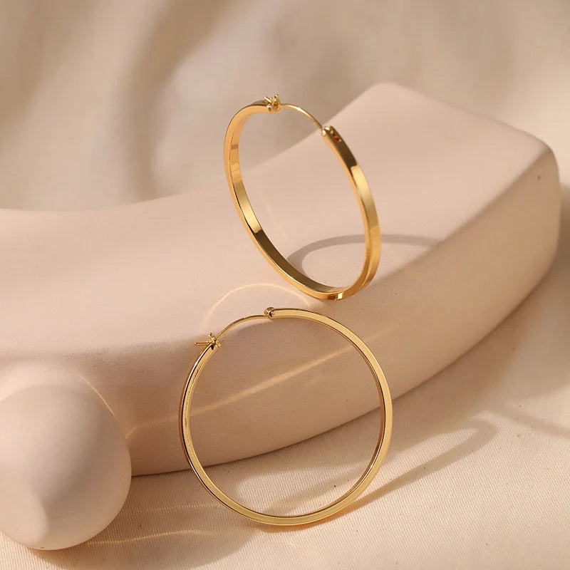 Mugrs™ 18 Karat Gold Zierliche Huggie Creolen