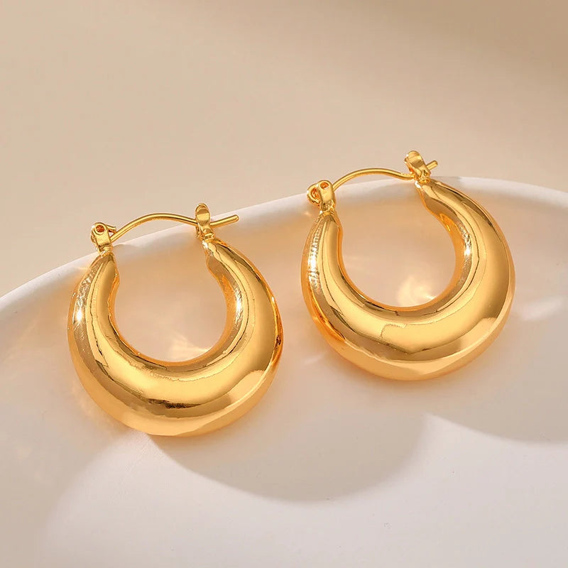 Mugrs™ – Klobige Creolen mit Doppelkreis aus 18 Karat Gold