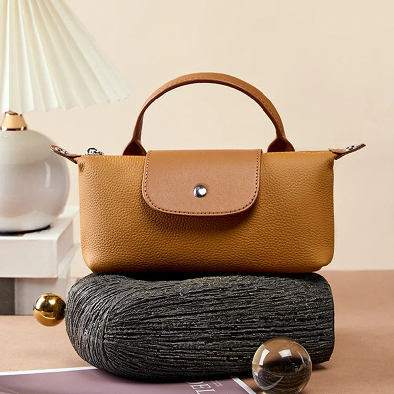 Mini pochette en cuir pour téléphone Mugrs™