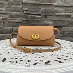 Mini sac à bandoulière en cuir simple avec bouton Mugrs™