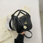 Mugrs™ Handtasche aus Rindsleder mit goldener Schnalle und Kissen im Luxusdesign