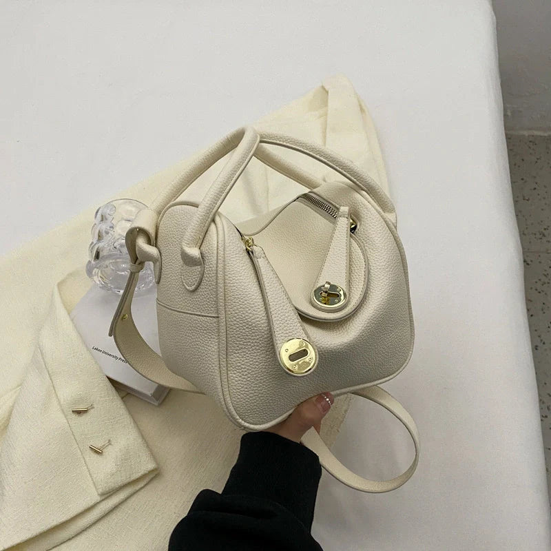 Mugrs™ Handtasche aus Rindsleder mit goldener Schnalle und Kissen im Luxusdesign