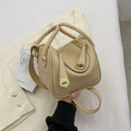 Mugrs™ Handtasche aus Rindsleder mit goldener Schnalle und Kissen im Luxusdesign