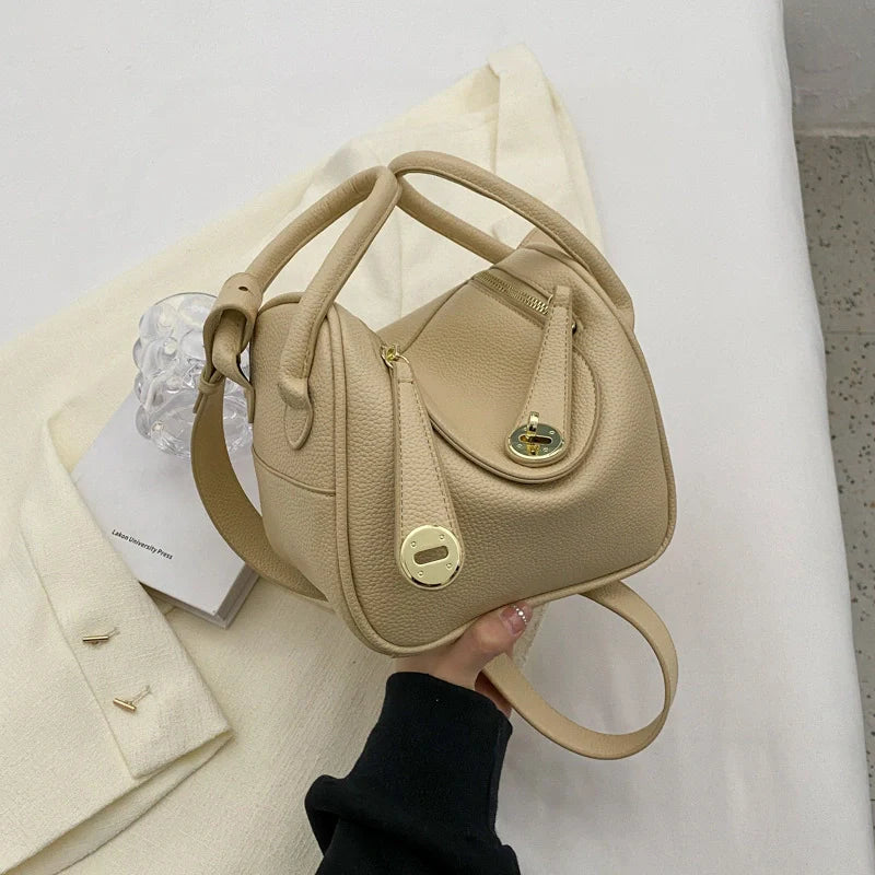 Mugrs™ Handtasche aus Rindsleder mit goldener Schnalle und Kissen im Luxusdesign