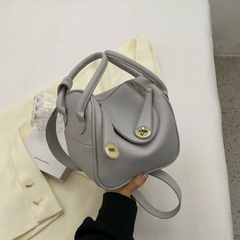 Mugrs™ Handtasche aus Rindsleder mit goldener Schnalle und Kissen im Luxusdesign