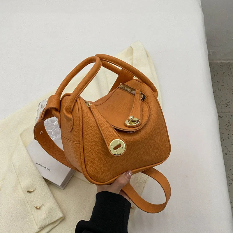 Mugrs™ Handtasche aus Rindsleder mit goldener Schnalle und Kissen im Luxusdesign