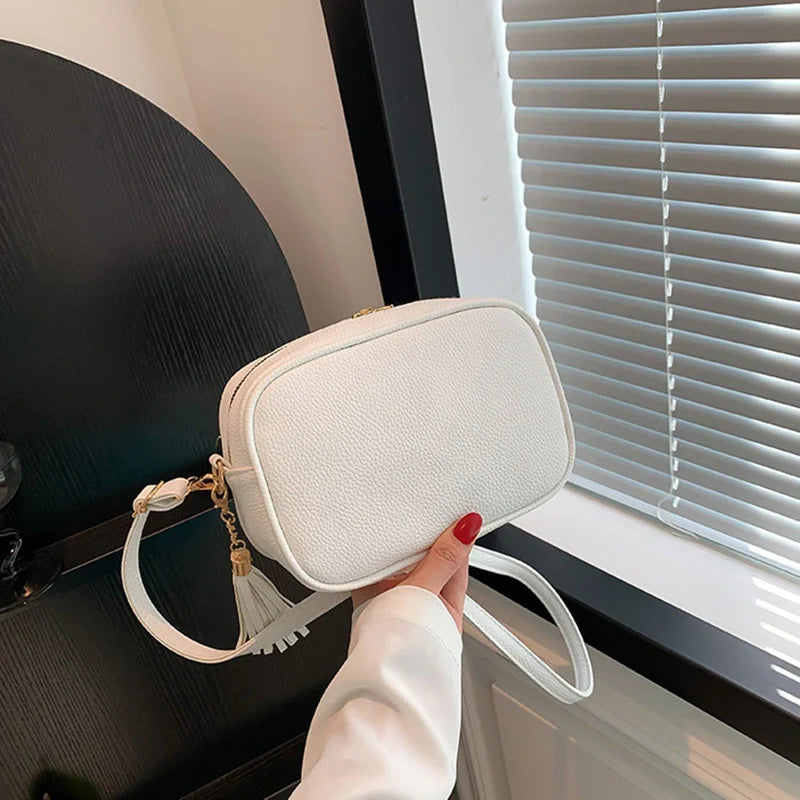 Sacoche de téléphone décontractée à fermeture éclair et pompon de luxe Mugrs™