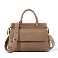 MUGRS women's crossbody bag in Tan – three-quarter angle, medium, hands-free