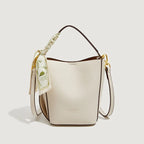 Mini sac à main seau Mugrs™ de deux façons de le porter