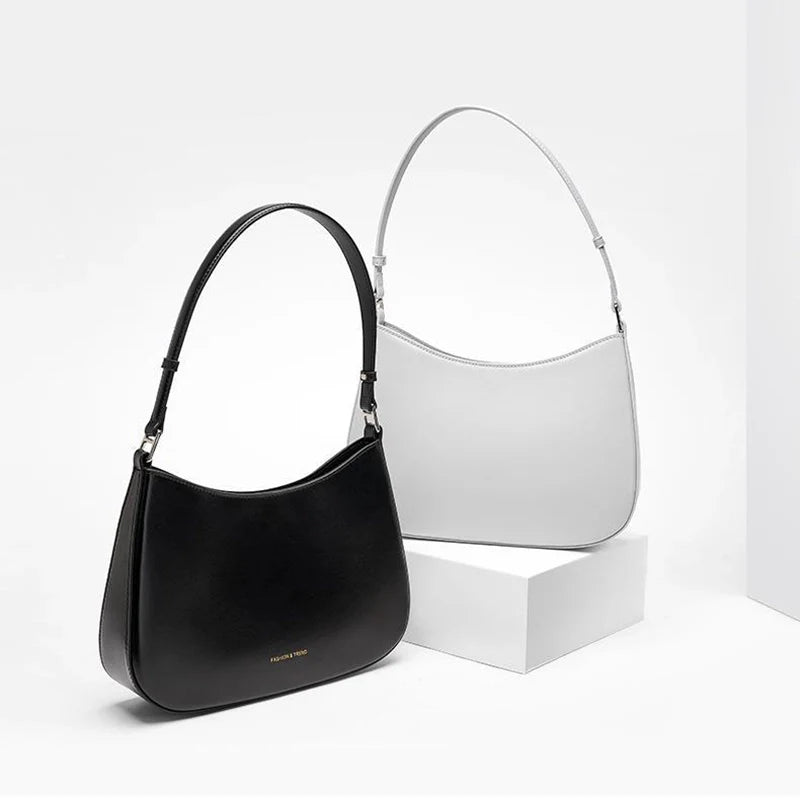 Mugrs™ Stilvolle Unterarm-Handtasche aus echtem Leder