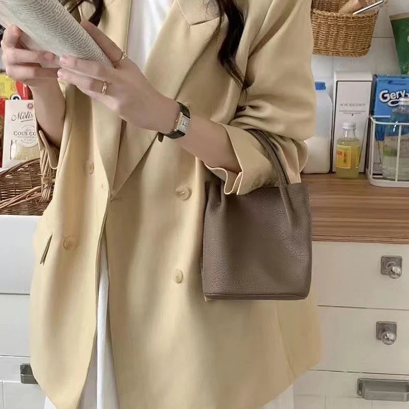 Sac seau Mugrs™ Sac bandoulière en cuir végétalien pur végétal