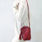 Sac à bandoulière pour téléphone portable à pompon Mugrs™