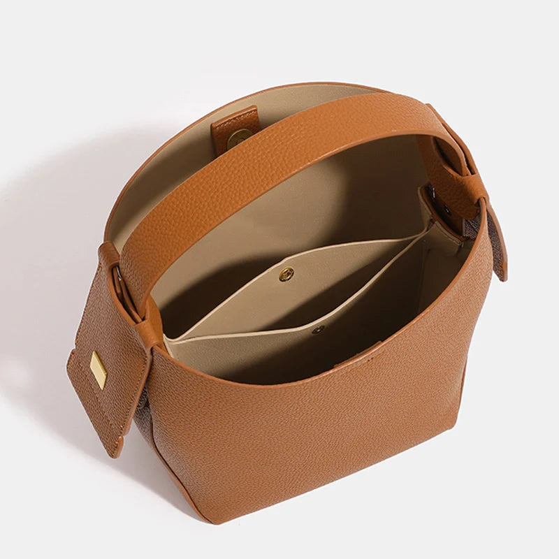 Sac seau à bandoulière Mugrs™