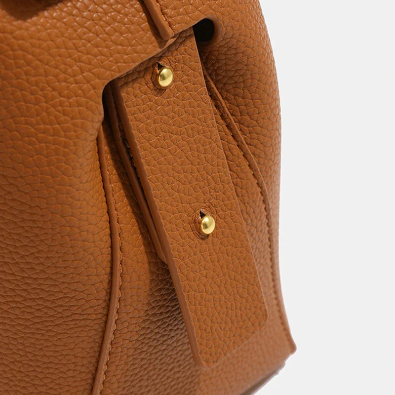 Sac seau à bandoulière Mugrs™