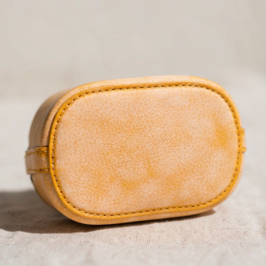MUGRS women's mini leather bag – stitched base detail, hand-waxed vegetable-tanned leather