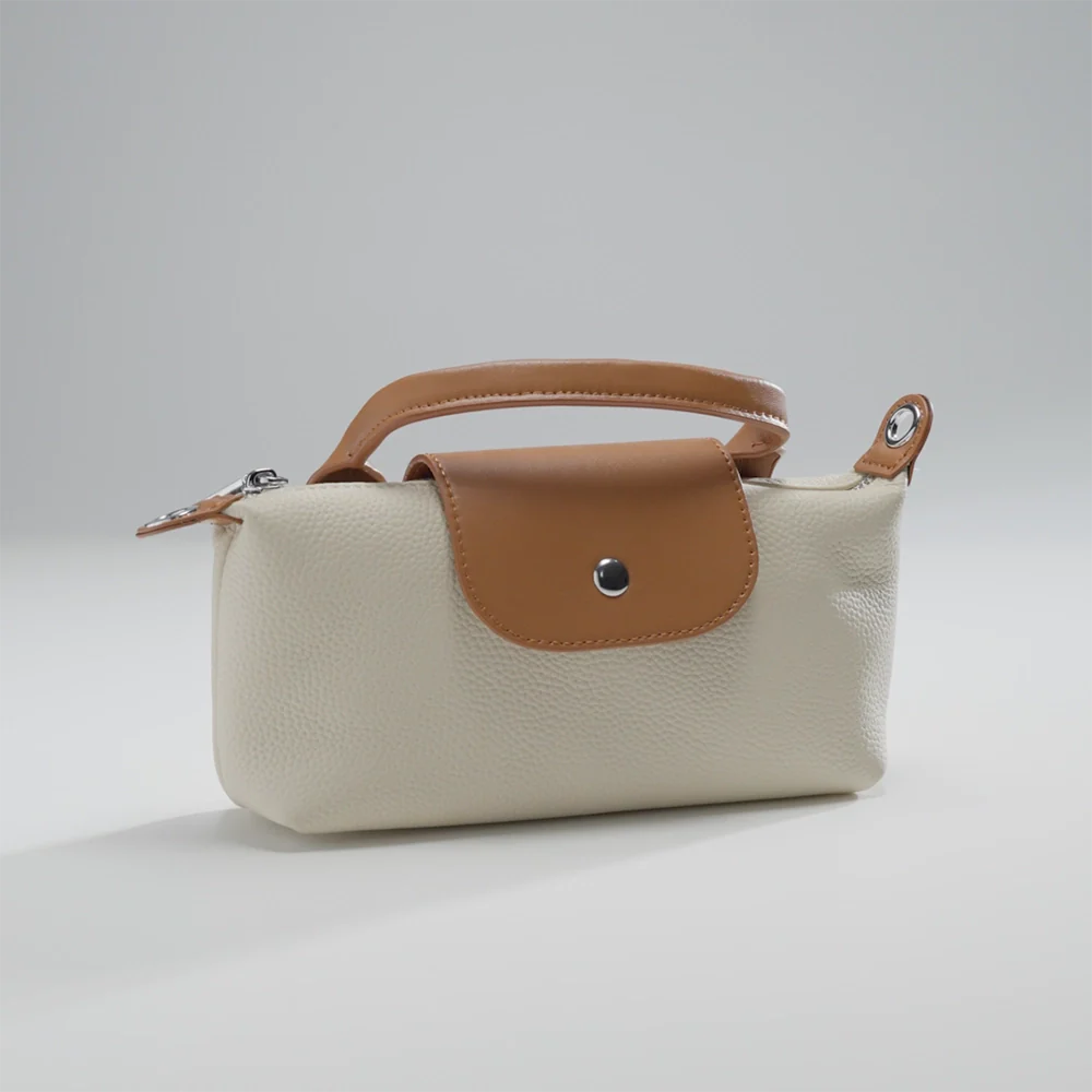 Mini pochette en cuir pour téléphone Mugrs™