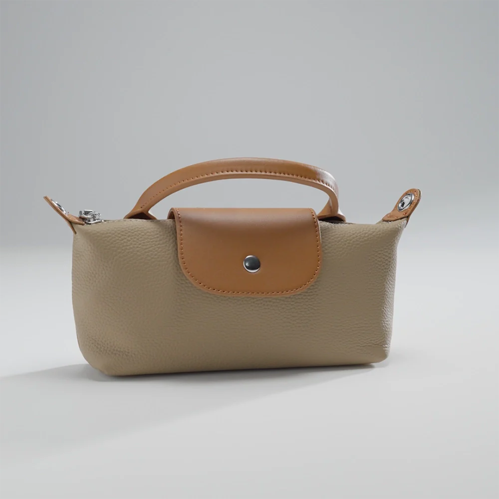 Mini pochette en cuir pour téléphone Mugrs™