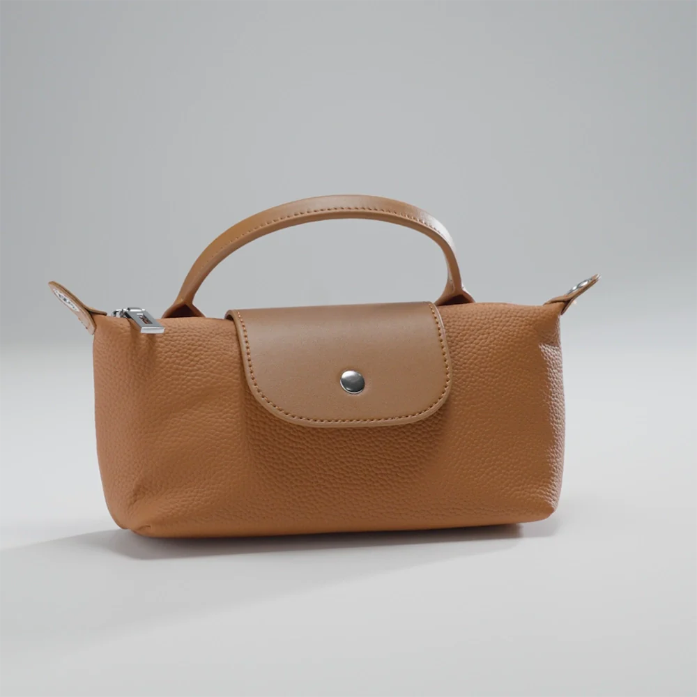 Mini pochette en cuir pour téléphone Mugrs™